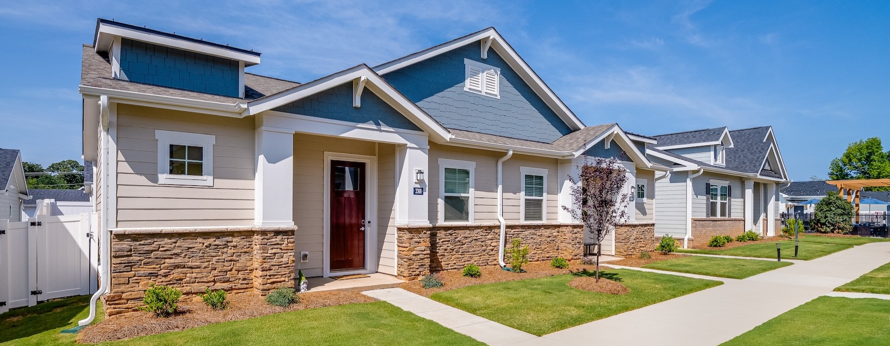 a row of houses with walkways