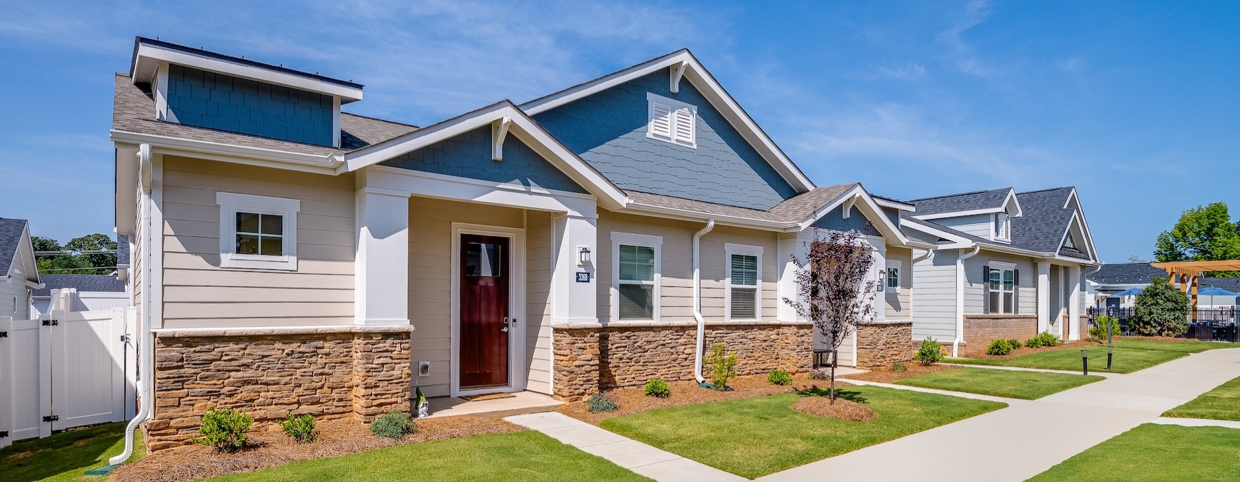 a row of houses with walkways