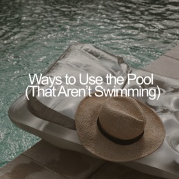 a sun hat beside pool water