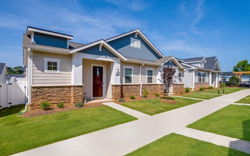 a row of houses with walkways